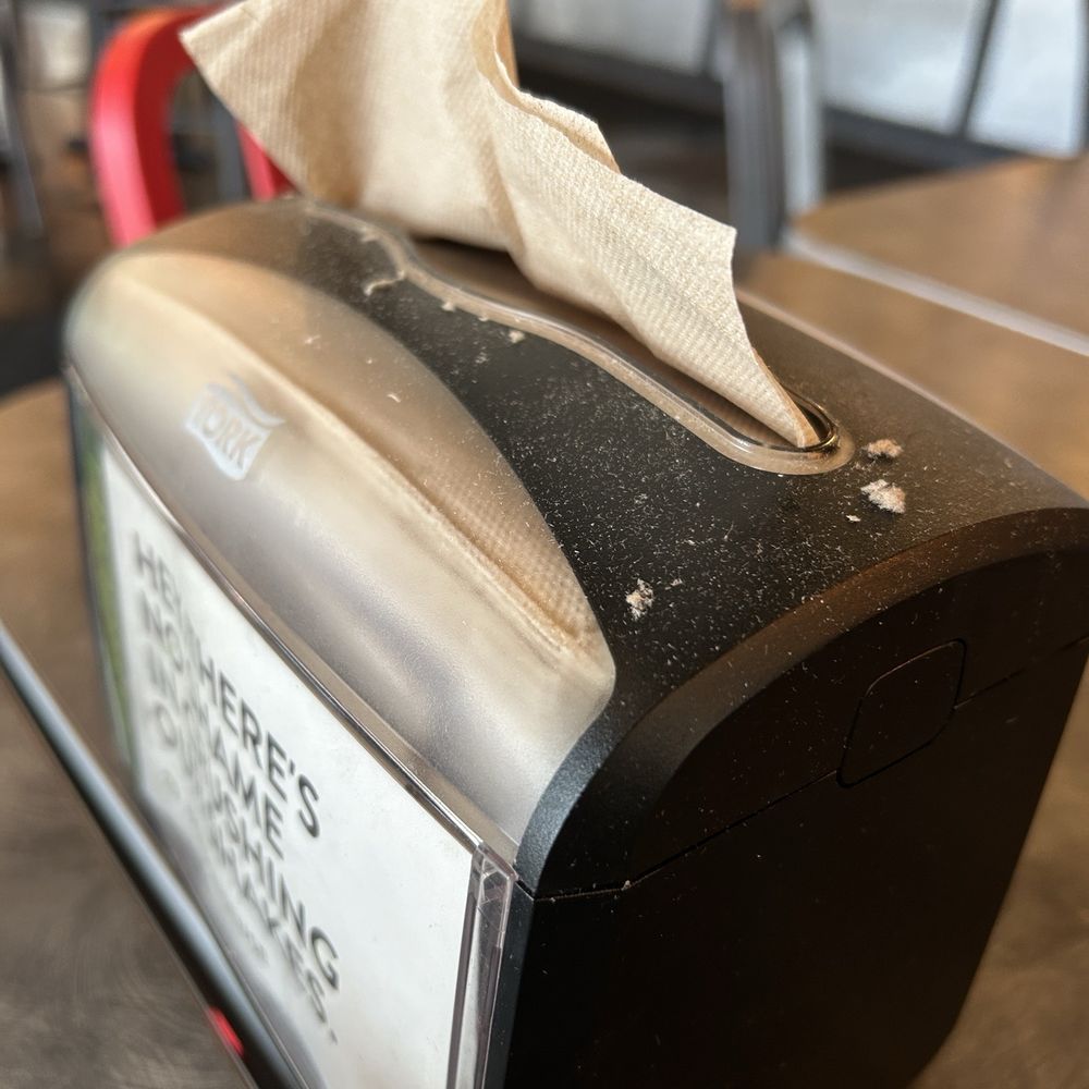 BurgerFi - So little business that the napkin dispensers have dust on them. - Burgers Near Me - Lake Mary, Florida