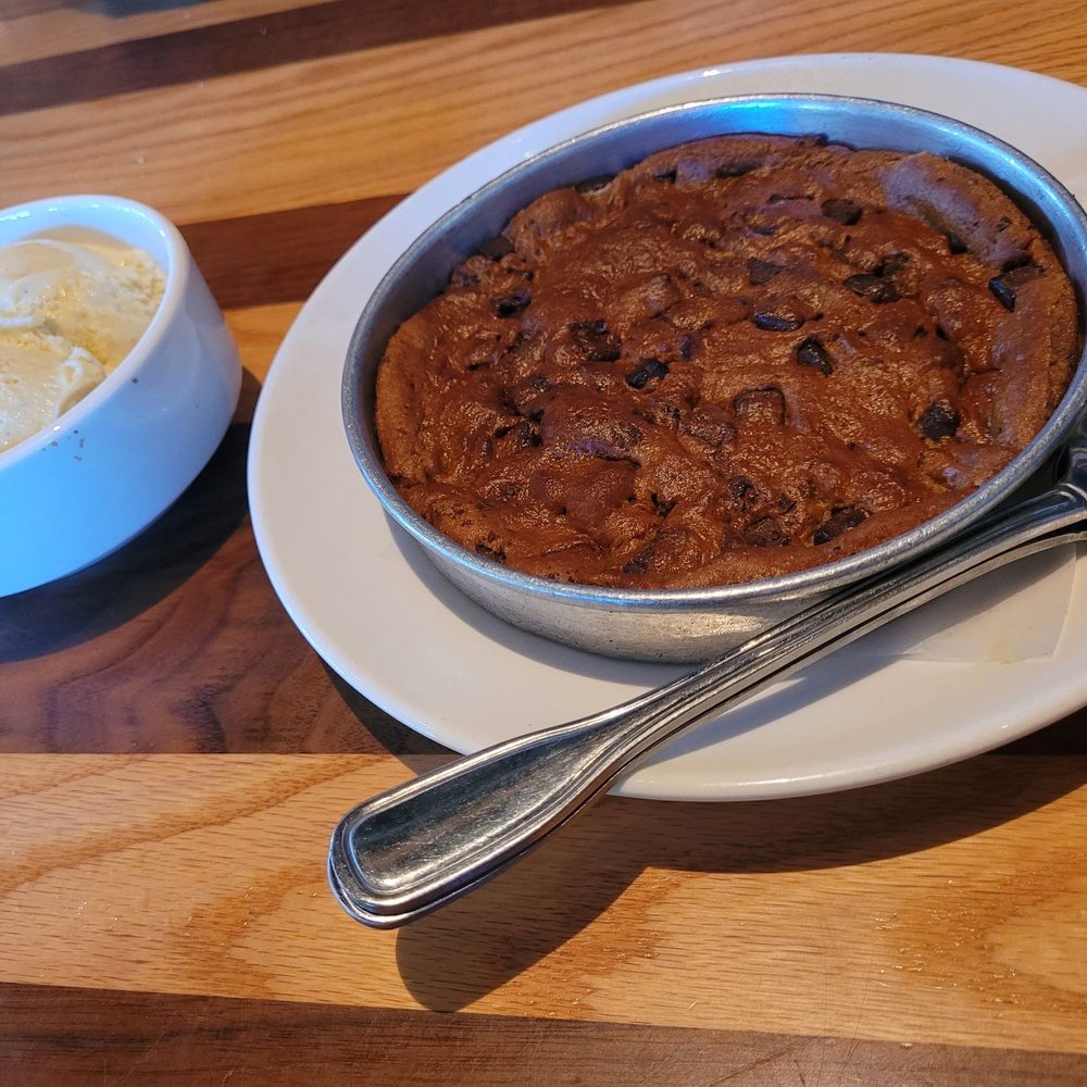 BJ's Restaurant & Brewhouse - Pizookie w ice cream on the side - New American Near Me - Livonia, Michigan BJ's Restaurant & Brewhouse - Pizookie w ice cream on the side - New American Near Me - Livonia, Michigan