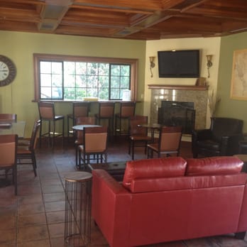 ABC CAFE - a red leather couch in the middle of the room - Coffee & Tea Near Me - Atascadero, California