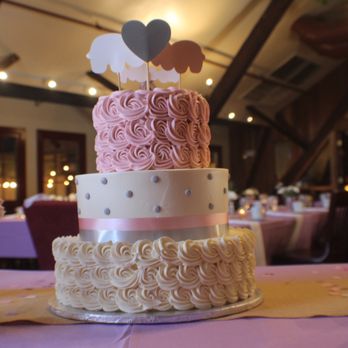 J & S Watkins - a wedding cake on a table - Bakeries Near Me - Clifton Park, New York J & S Watkins - a wedding cake on a table - Bakeries Near Me - Clifton Park, New York