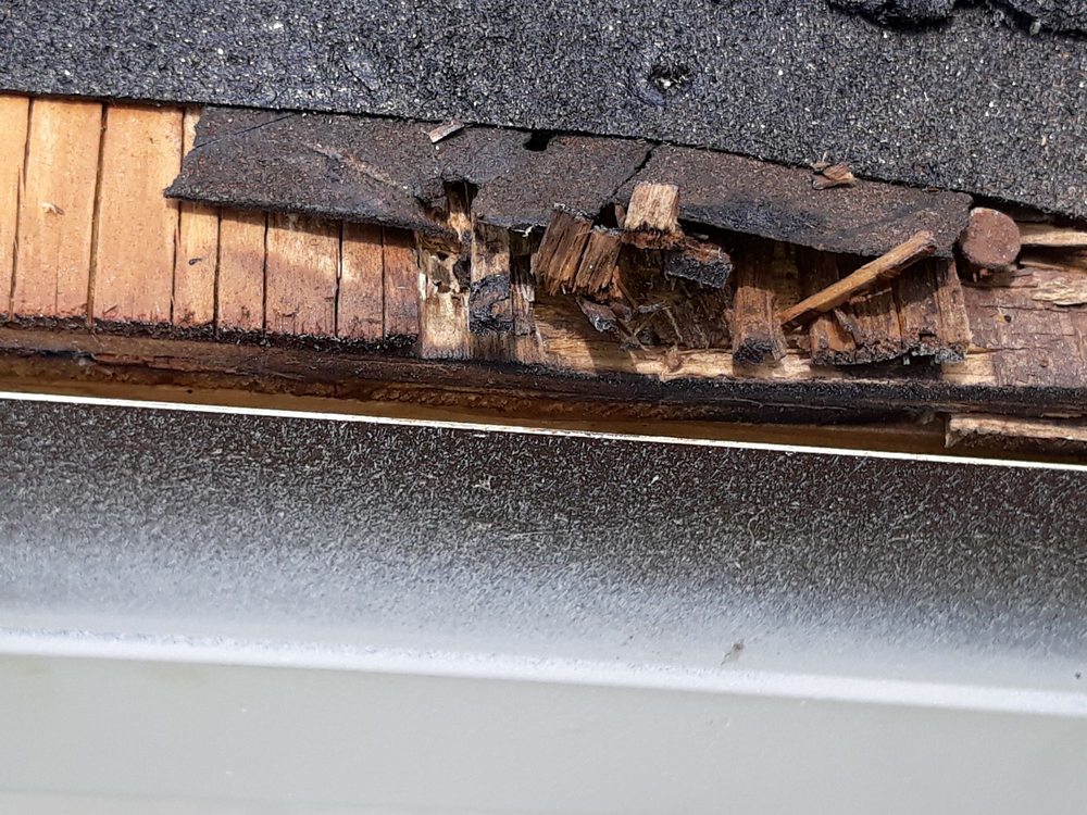 Slide of Quality First Roofing