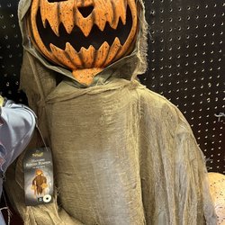 Spirit Halloween - Pumpkin person.