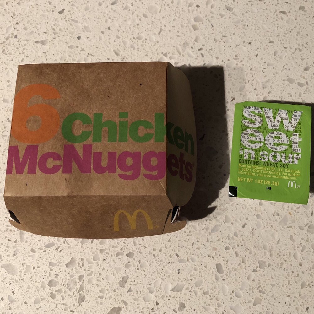 McDonald's - a box of chicken mcnuggs and a packet of chicken mcnuggs - Burgers Near Me - Gig Harbor, Washington McDonald's - a box of chicken mcnuggs and a packet of chicken mcnuggs - Burgers Near Me - Gig Harbor, Washington