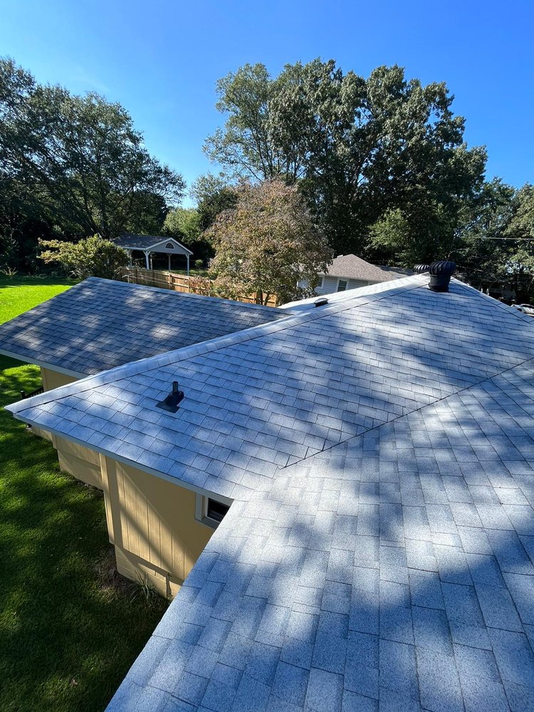 Slide of Hill Top Roofing