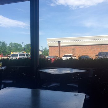 Renshaw Lounge - Patio area, looking over the parking lot. - Pizza Near Me - Clawson, Michigan Renshaw Lounge - Patio area, looking over the parking lot. - Pizza Near Me - Clawson, Michigan