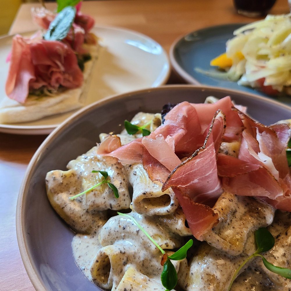 Upper left: crostini, upper right: sea bass, main: rigatoni Upper left: crostini, upper right: sea bass, main: rigatoni