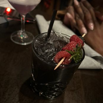Torbert Street Social - a close up of a drink with strawberries - Cocktail Bars Near Me - Wilmington, Delaware Torbert Street Social - a close up of a drink with strawberries - Cocktail Bars Near Me - Wilmington, Delaware