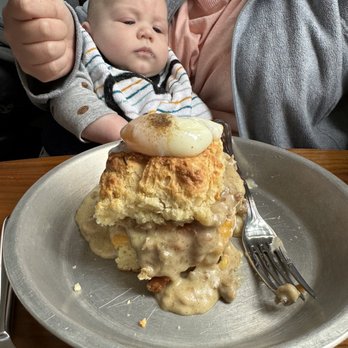Buford's Biscuits - "The Cure" Biscuit being eyed by my son Brayden. - New American Near Me - Leesburg, Virginia
