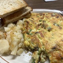 Pavlos' Restaurant - Veggies omelet, home fries and sourdough toast