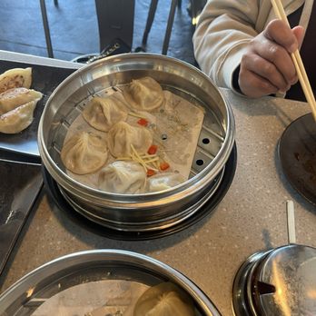 Mason's Dumpling Shop - Aurora - Streamed pork and crab soup dumplings with the cubed red bell peppers. The other was steamed chicken soup dumplings - Chinese Near Me - Aurora, Colorado