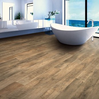 Discount Dave's Carpet & Flooring - a bathtub in a bathroom - Flooring Near Me - Springfield, Missouri Discount Dave's Carpet & Flooring - a bathtub in a bathroom - Flooring Near Me - Springfield, Missouri