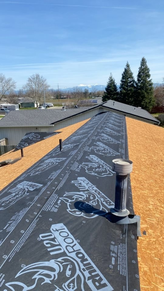 Slide of Tugwell Roofing