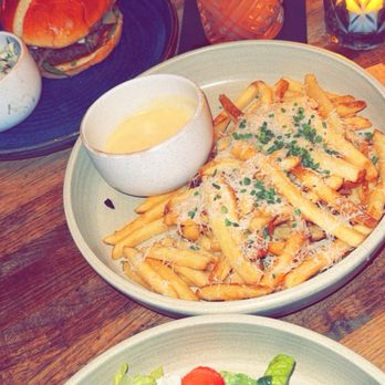 Eureka! - Black and Blue Mushroom Burger, Truffle Cheese Fries, Goat Cheese Citrus Salad - American Near Me - Indian Wells, California Eureka! - Black and Blue Mushroom Burger, Truffle Cheese Fries, Goat Cheese Citrus Salad - American Near Me - Indian Wells, California