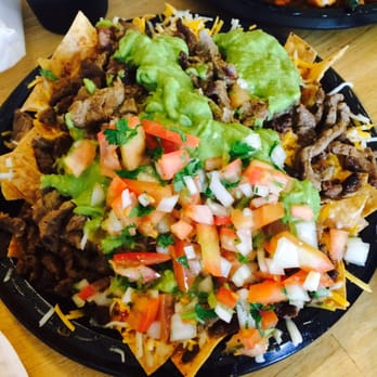 Colima's Mexican Restaurant - Carne Asada Nacho - Mexican Near Me - Oceanside, California Colima's Mexican Restaurant - Carne Asada Nacho - Mexican Near Me - Oceanside, California