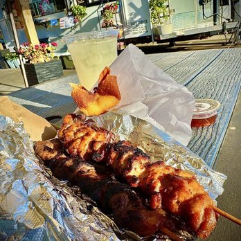 Kiki’s Corner - Beef and pork stick. They're very good. I can taste the herb and lemongrass. Lychee refresher is bomb. Love me the Crab wonton. - Laotian Near Me - Fresno, California