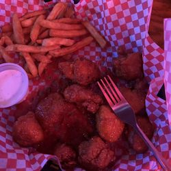 Rookies Rockin' Sports Bar - Boneless wings covered in sweet chile sauce and fries. BIG portions - worth the $!