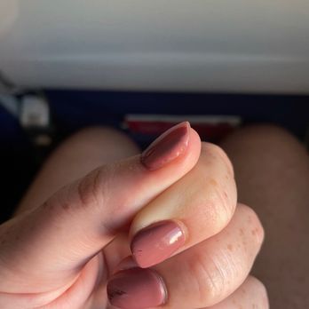 Queen Spa - Poorly done side, can't see the acrylic buildup that wasn't cleaned up either. - Skin Care Near Me - Austin, Texas