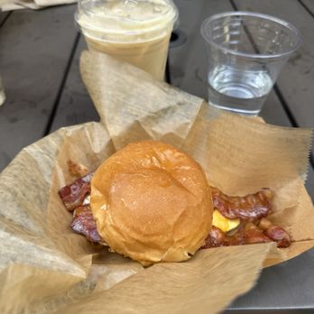 Wooden Robot Brewery - Egg, bacon & cheese and a potato bun iced caramel latte - Breweries Near Me - Charlotte, North Carolina Wooden Robot Brewery - Egg, bacon & cheese and a potato bun iced caramel latte - Breweries Near Me - Charlotte, North Carolina