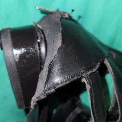 Express Shoe Repair - This shows the upper part of the back heel was not put back in place.