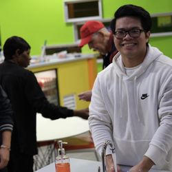 Exygon Health & Fitness Club - Enjoy our front area with tables, a convenient hand washing station, and free coffee--perfect for connecting before or after your workout.