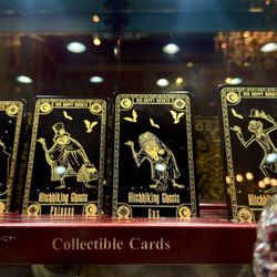 Haunted Mansion Tarot Collectible cards on display.