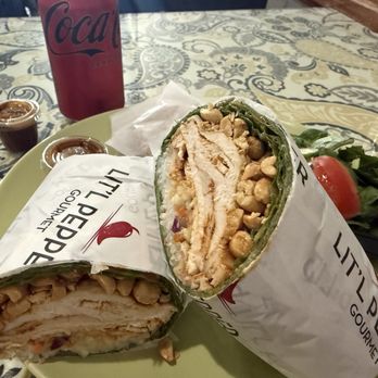 Lit'l Pepper Gourmet - Thai Chicken wrap. Love the peanut sauce. Warm rice in the wrap is a nice touch. - Delis Near Me - San Diego, California Lit'l Pepper Gourmet - Thai Chicken wrap. Love the peanut sauce. Warm rice in the wrap is a nice touch. - Delis Near Me - San Diego, California