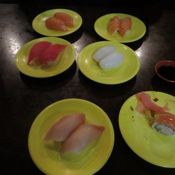 541 Sushi Bar - salmon (back), squid (middle right), tuna (middle left), yellowtail (top left) - Sushi Bars Near Me - Eugene, Oregon