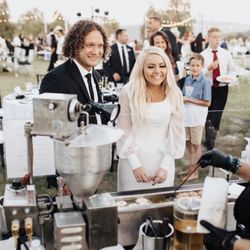 The Fry Girl - How cute are this bride & groom, admiring the fun & yummy made mini donuts being freshly made right there for them & their guests?