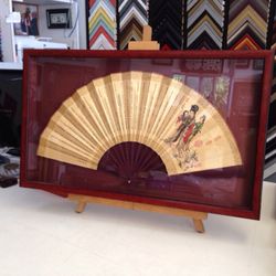The Glenn Custom Framing - Hand painted fan from China. Simple but elegant 3-dimensional application. Studio moulding, UV acrylic, silk mat backing