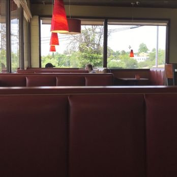 Denny's - a person sitting at a table in a restaurant - Diners Near Me - Newcastle, California