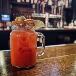 The House Bloody. Served with olives, a lime wedge, and Old Bay on the rim. 5/5.