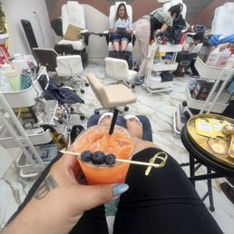 Spa pedicure #4, gel $80. With a piña  colada drink