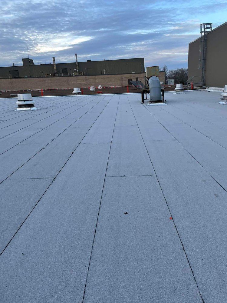 Slide of Sagan Commercial Roofing