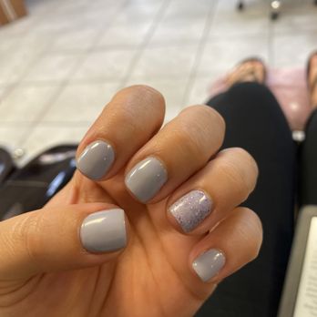 Sandy Nails and Spa - Gel "shellac" manicure with a glitter top coat on the the ring finger - Nail Salons Near Me - Grand Haven, Michigan Sandy Nails and Spa - Gel "shellac" manicure with a glitter top coat on the the ring finger - Nail Salons Near Me - Grand Haven, Michigan