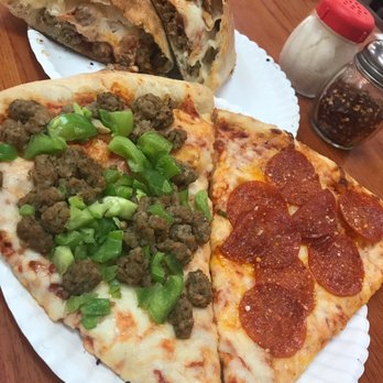 One Guy from Italy University - House calzone (pepperoni, sausage, cheese, and sauce), and two slices. - Pizza Near Me - Lubbock, Texas One Guy from Italy University - House calzone (pepperoni, sausage, cheese, and sauce), and two slices. - Pizza Near Me - Lubbock, Texas