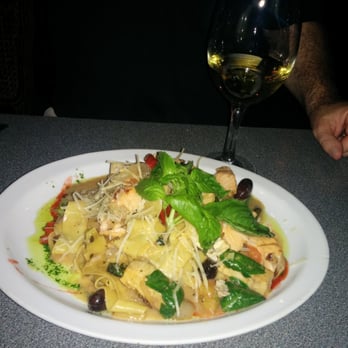 Moxie - Mixed seafood tossed with wide noodles - New American Near Me - Sacramento, California Moxie - Mixed seafood tossed with wide noodles - New American Near Me - Sacramento, California