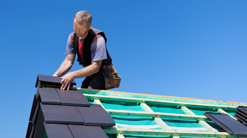 Slide of Bell Roofing Company