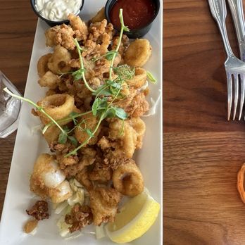 Firefish Grill - Freshly batter calamari! Served with tartar sauce and cocktail sauce. - New American Near Me - Santa Cruz, California Firefish Grill - Freshly batter calamari! Served with tartar sauce and cocktail sauce. - New American Near Me - Santa Cruz, California