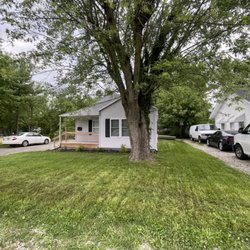Lawn care service - Before and after on overgrown yard