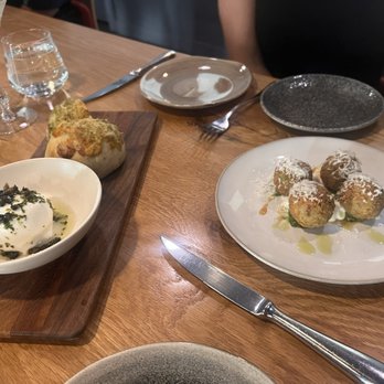 Olivia - Burrata w/crispy capers and complimentary focaccia to kick things off, arancini on the right (w/honey and ricotta- so good!) - Italian Near Me - Denver, Colorado Olivia - Burrata w/crispy capers and complimentary focaccia to kick things off, arancini on the right (w/honey and ricotta- so good!) - Italian Near Me - Denver, Colorado