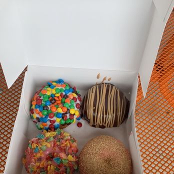 Quack Daddy Donuts - Vanilla frosting with m&ms, chocolate icing with PB drizzle, strawberry icing with fruity pebbles, and strawberry icing with graham cracker - Donuts Near Me - Westfield, Indiana Quack Daddy Donuts - Vanilla frosting with m&ms, chocolate icing with PB drizzle, strawberry icing with fruity pebbles, and strawberry icing with graham cracker - Donuts Near Me - Westfield, Indiana