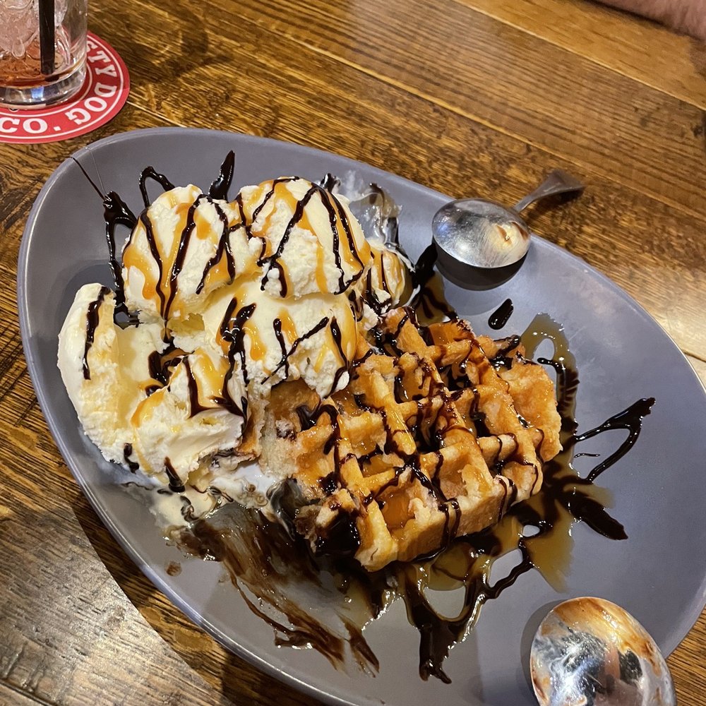 a plate of waffles and ice cream a plate of waffles and ice cream