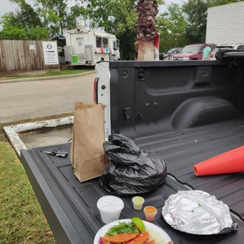 Tacos El Grande - a plate of food in the bed of a pickup truck - Food Trucks Near Me - Katy, Texas