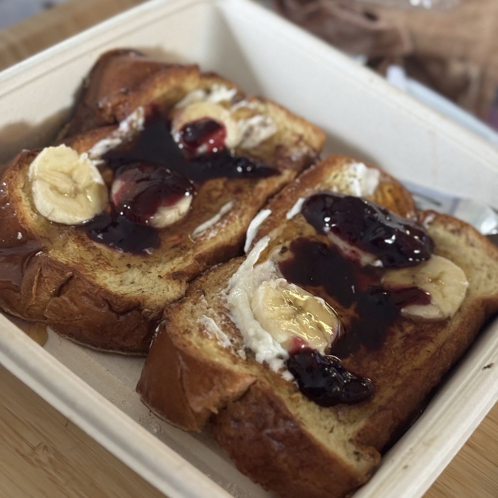 French Toast with Berry Compote and added Bananas and Syrup. French Toast with Berry Compote and added Bananas and Syrup.