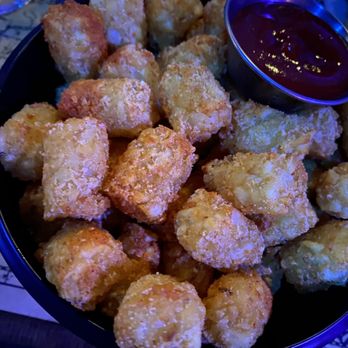 Storm Crow Manor - Frank's Red Hot tater tots - Bars Near Me - Toronto, Ontario