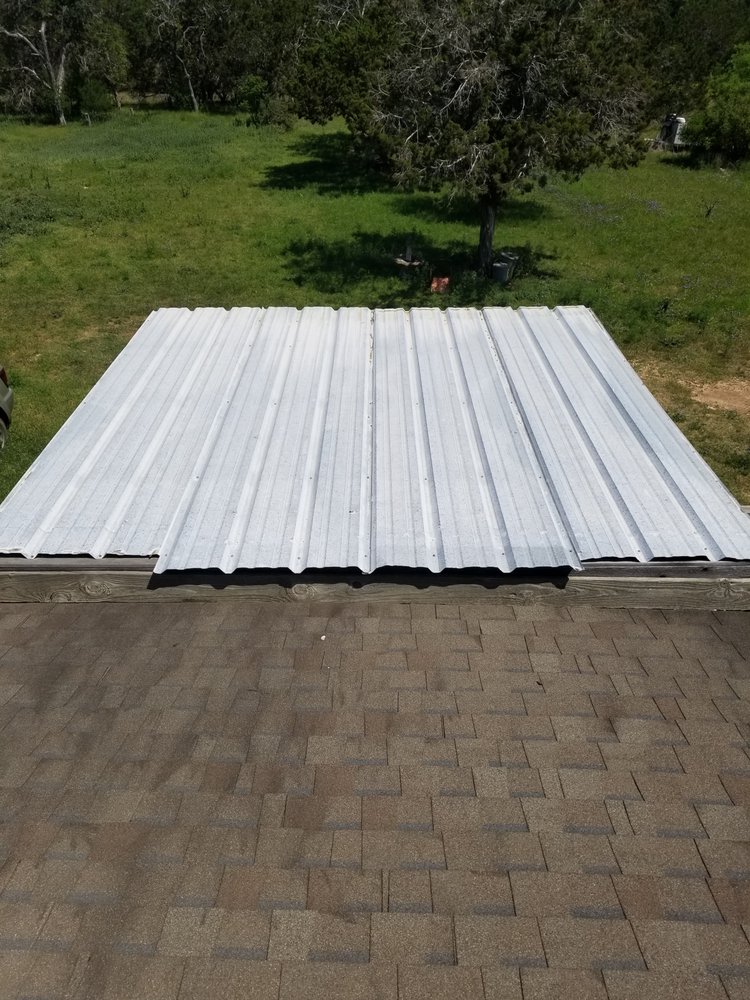 Slide of Roesler's Roofing & Remodeling