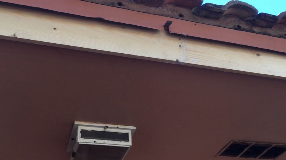 Slide of Suntek Roofing