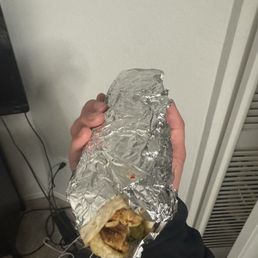 Skimped on everything, didn't roll into burrito shape, didn't cover properly. Slid the exposed burrito across a dirty counter. Fix your Skimped on everything, didn't roll into burrito shape, didn't cover properly. Slid the exposed burrito across a dirty counter. Fix your