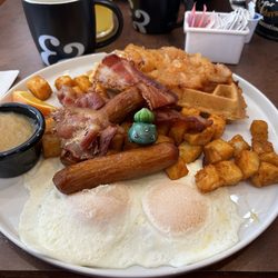 Ben & Florentine - Bulbasaur and the Caramel Apple Waffles :) (Eggs over-easy, home fries, bacon, sausage, and apple sauce)