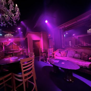 JEWEL - a fancy living room with a chandelier and chandelier - Lounges Near Me - Orlando, Florida JEWEL - a fancy living room with a chandelier and chandelier - Lounges Near Me - Orlando, Florida